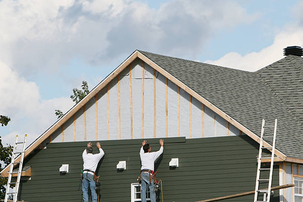 Professional Storm Damage Siding Repair technician working in Paradise, PA
